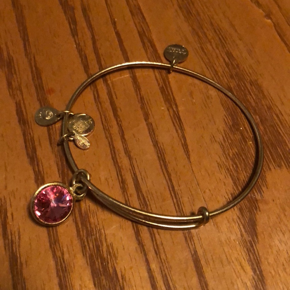 Gold Alex & ani bracelet w/ pink stone